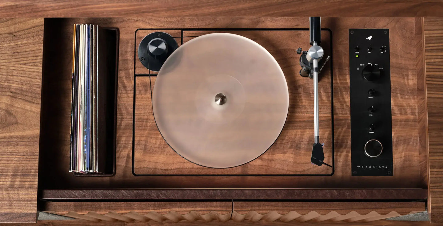 Wrensilva Record Player Cabinet, model The Standard in Natural Walnut. Top down view of the turntable. Vinyl and works with Sonos, plus record storage. Built in console cabinet speakers too.